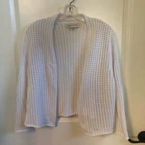 Shrug. White cotton.